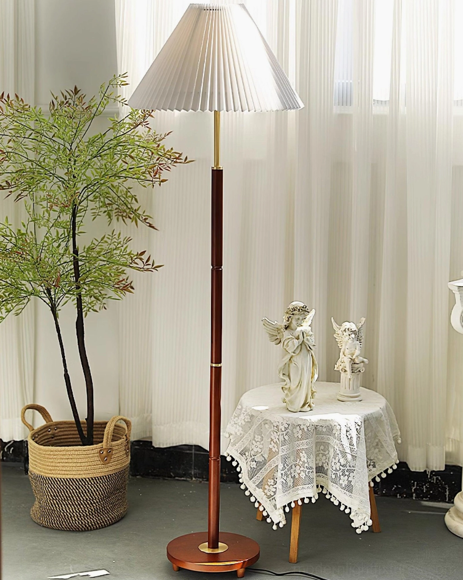 Elegant mid-century floor lamp with pleated white shade in sophisticated vintage living room