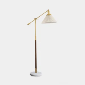 Pleated swing arm floor lamp with brass metal pole and marble base, front studio view showing architectural pleated fabric shade design