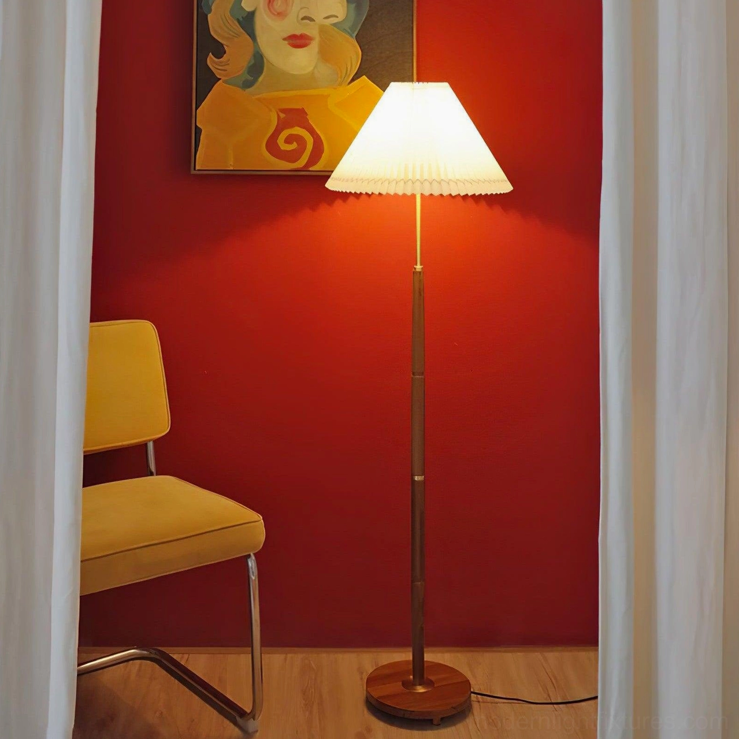 Mid-century modern floor lamp with pleated shade illuminated in warm home interior setting