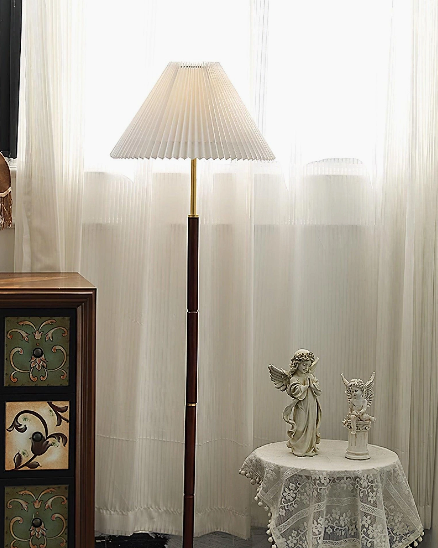 Retro-style pleated floor lamp with fabric shade and wooden frame in living space
