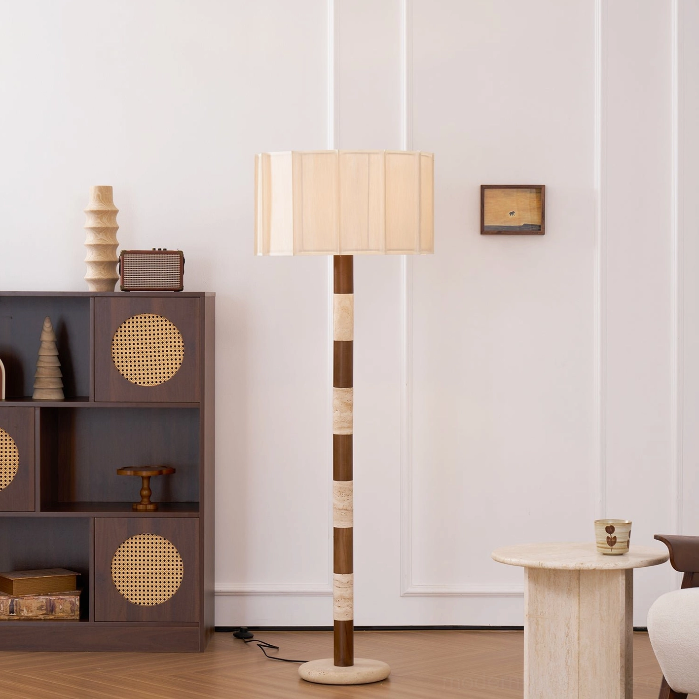 Pleated grove floor lamp with dual-bulb capacity demonstrating the soft warm illumination quality of the pleated fabric shade in interior setting