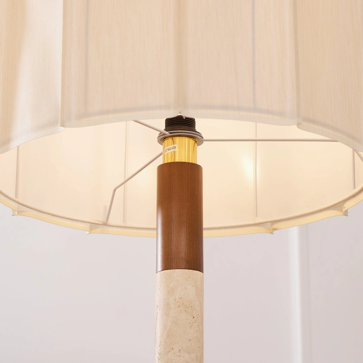 Pleated grove floor lamp as focal point in mid-century modern living room setting with walnut wood accents and vintage-inspired furnishings