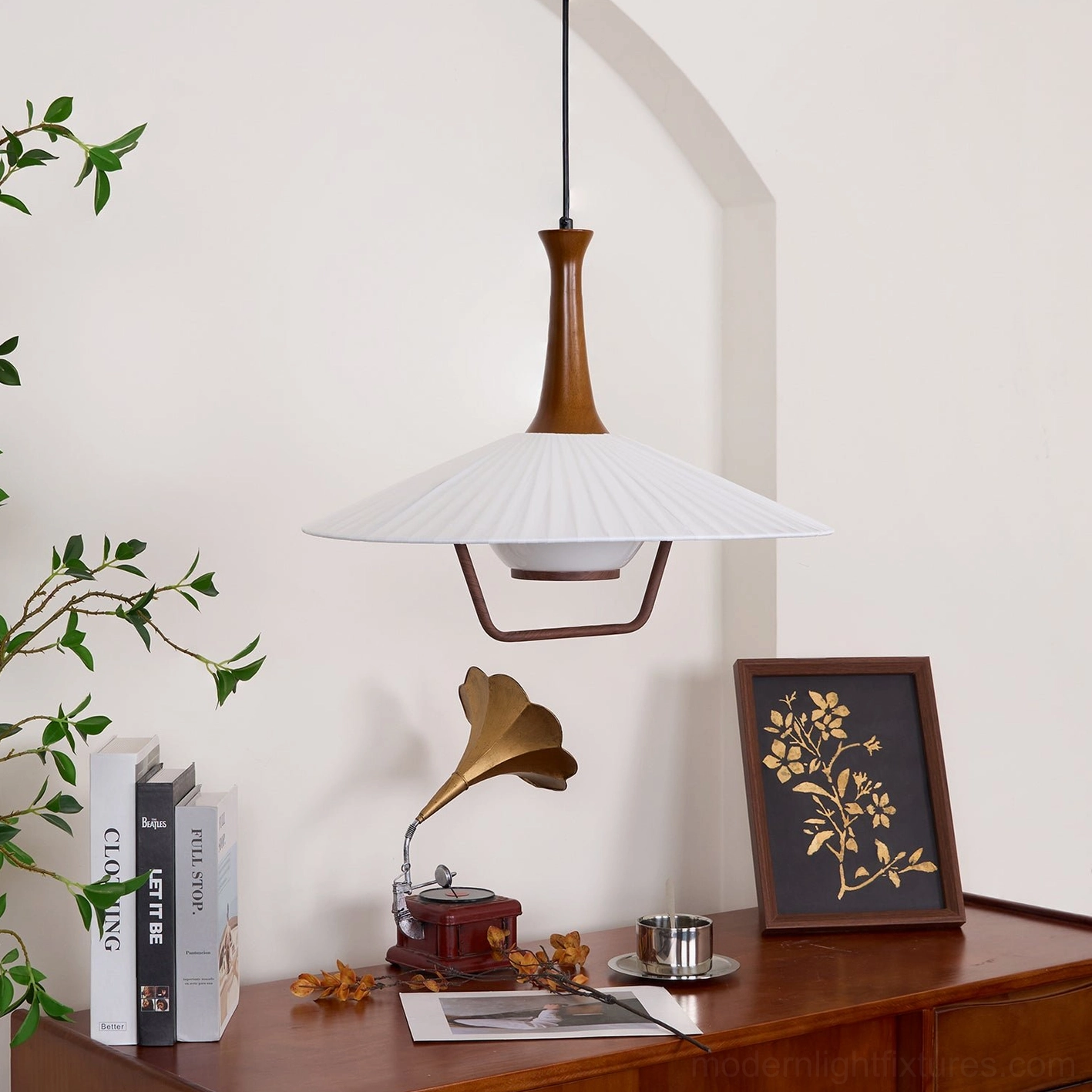 Pleated pendant lamp fabric shade construction showing accordion fold pattern and light transmission