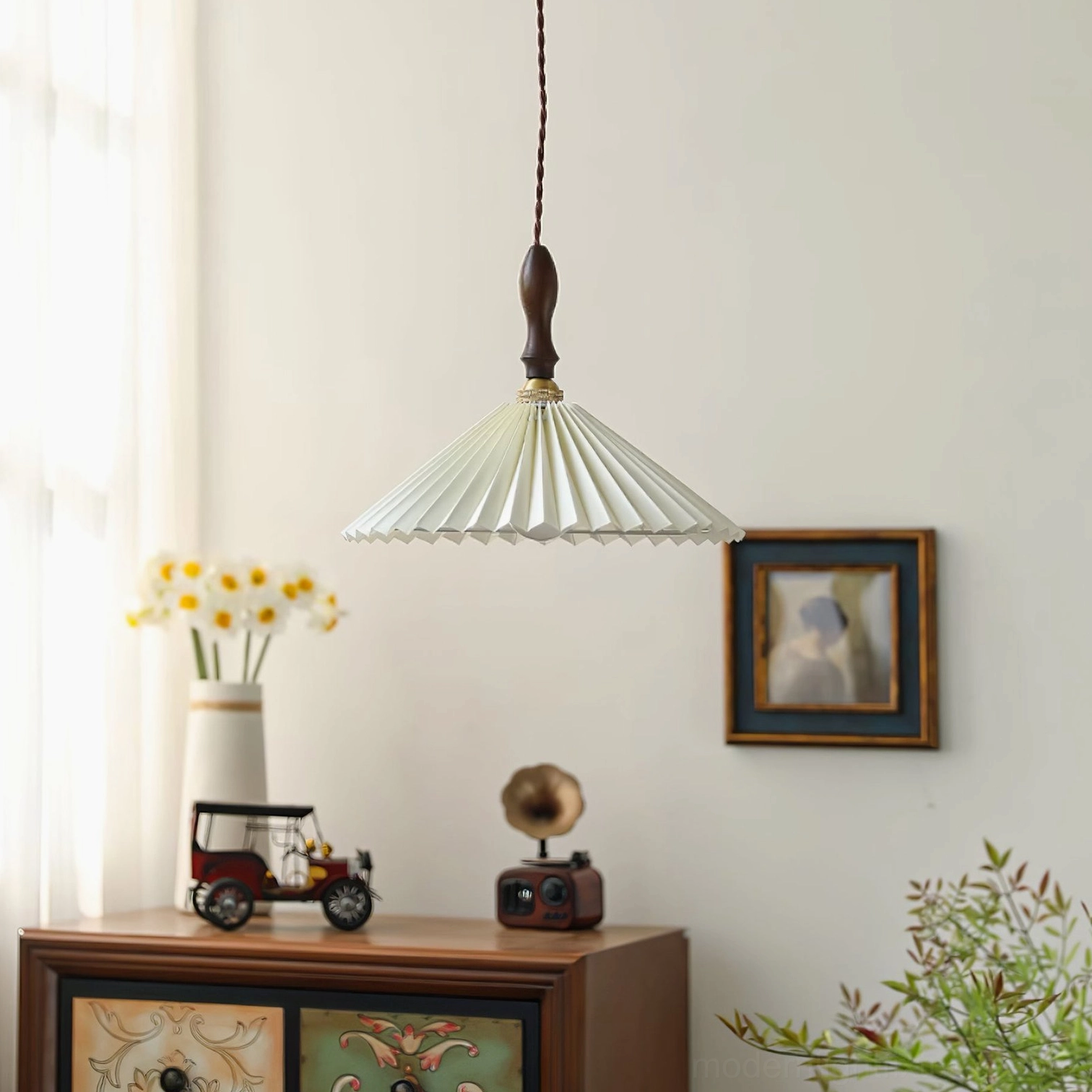 Conical pleated pendant light displayed in vintage home setting with walnut wood suspension and beige fabric