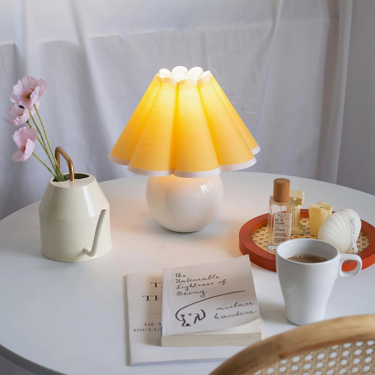 Pleated fabric sunburst table lamp contemporary interior design accent piece with sculptural ceramic base