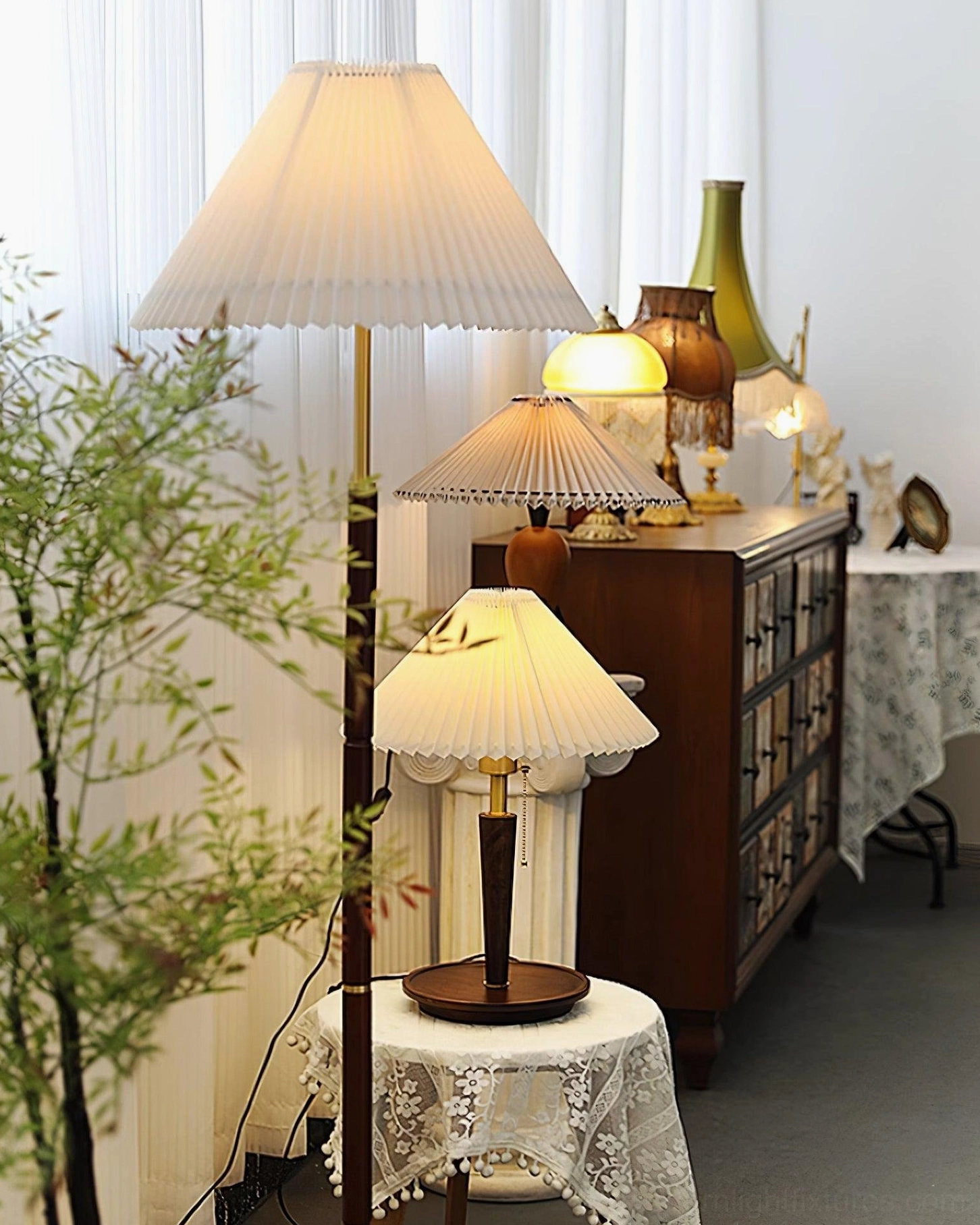 Suki pleated table lamp styled in minimalist modern bedroom on nightstand creating restful ambient lighting