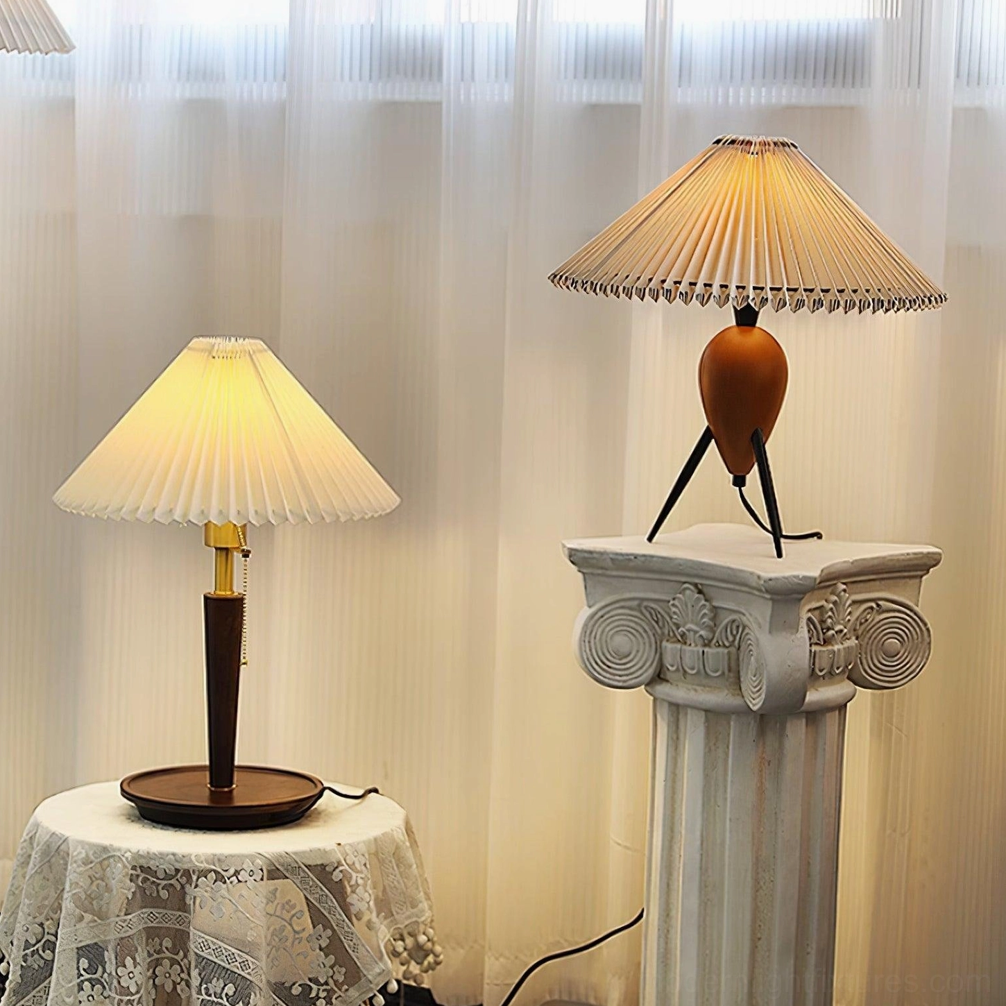 Pleated fabric table lamp demonstrating soft diffused light distribution through carefully engineered shade construction