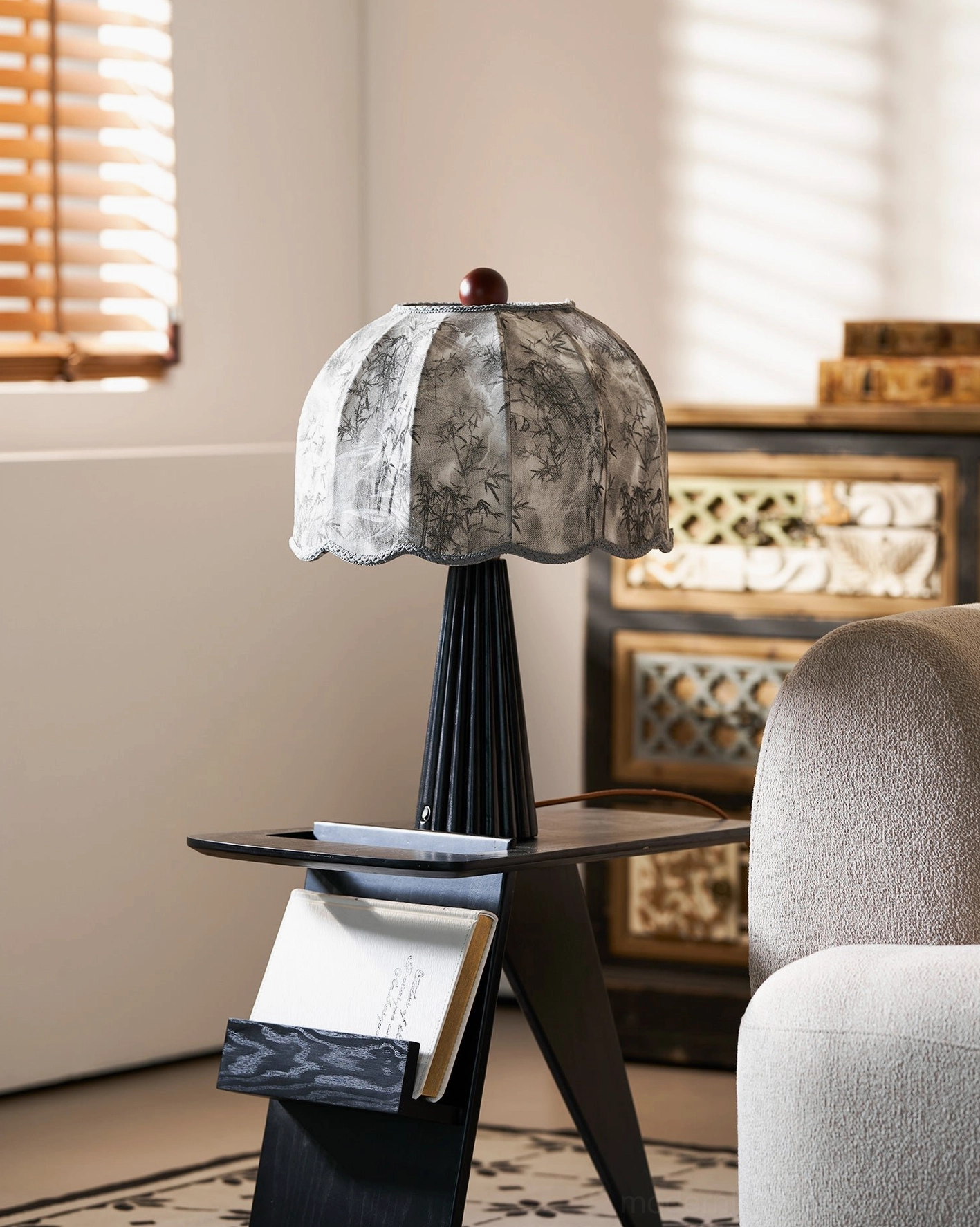 Pleated wood base table lamp three-quarter angle view - sculptural form and proportions
