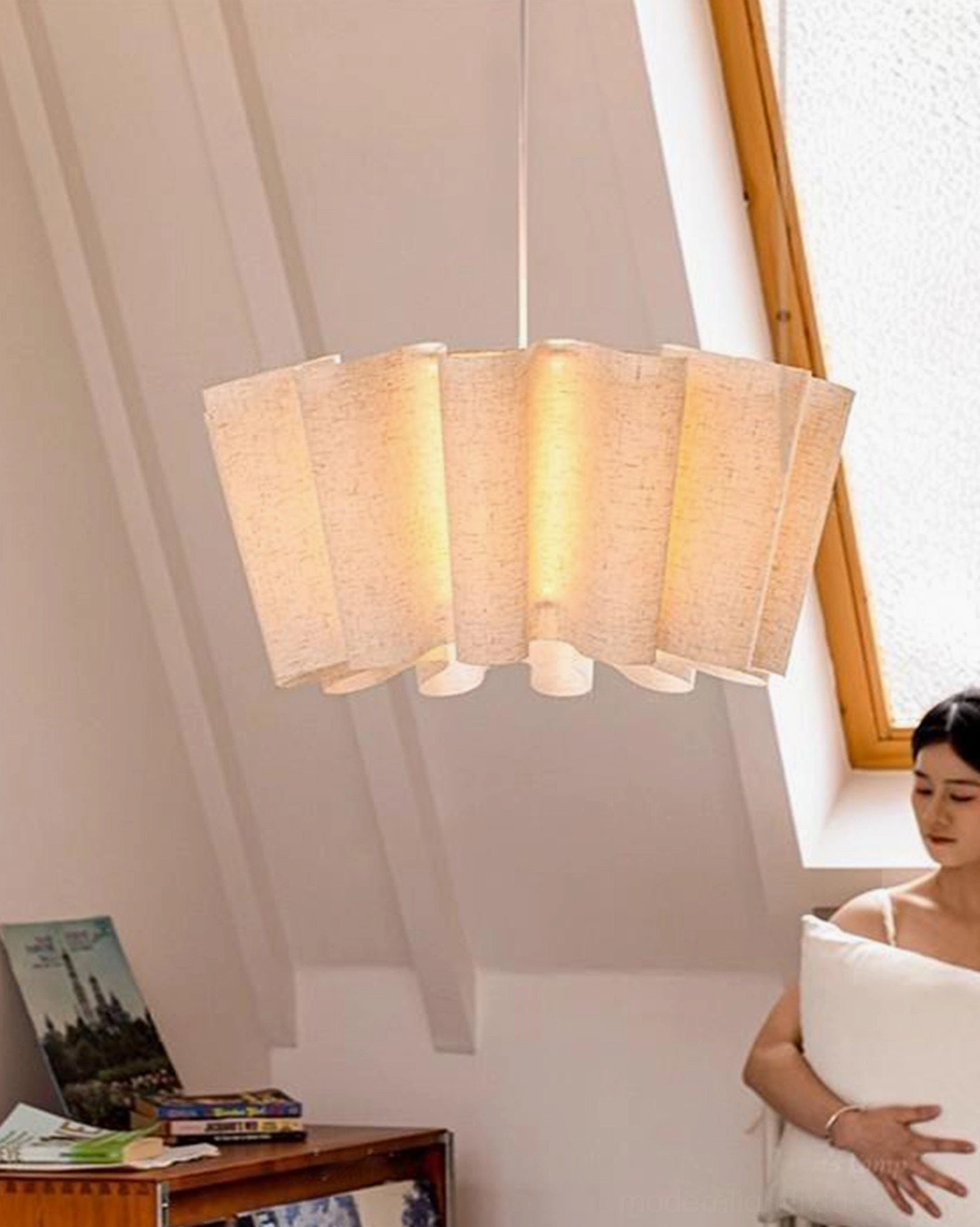 Pleora pleated pendant ceiling light installation showing metal framework detail