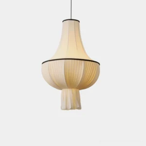 Plisselle pleated fabric pendant light with tiered bell and bowl shape, cream fabric with black trim, studio flat-lay frontal view on white background