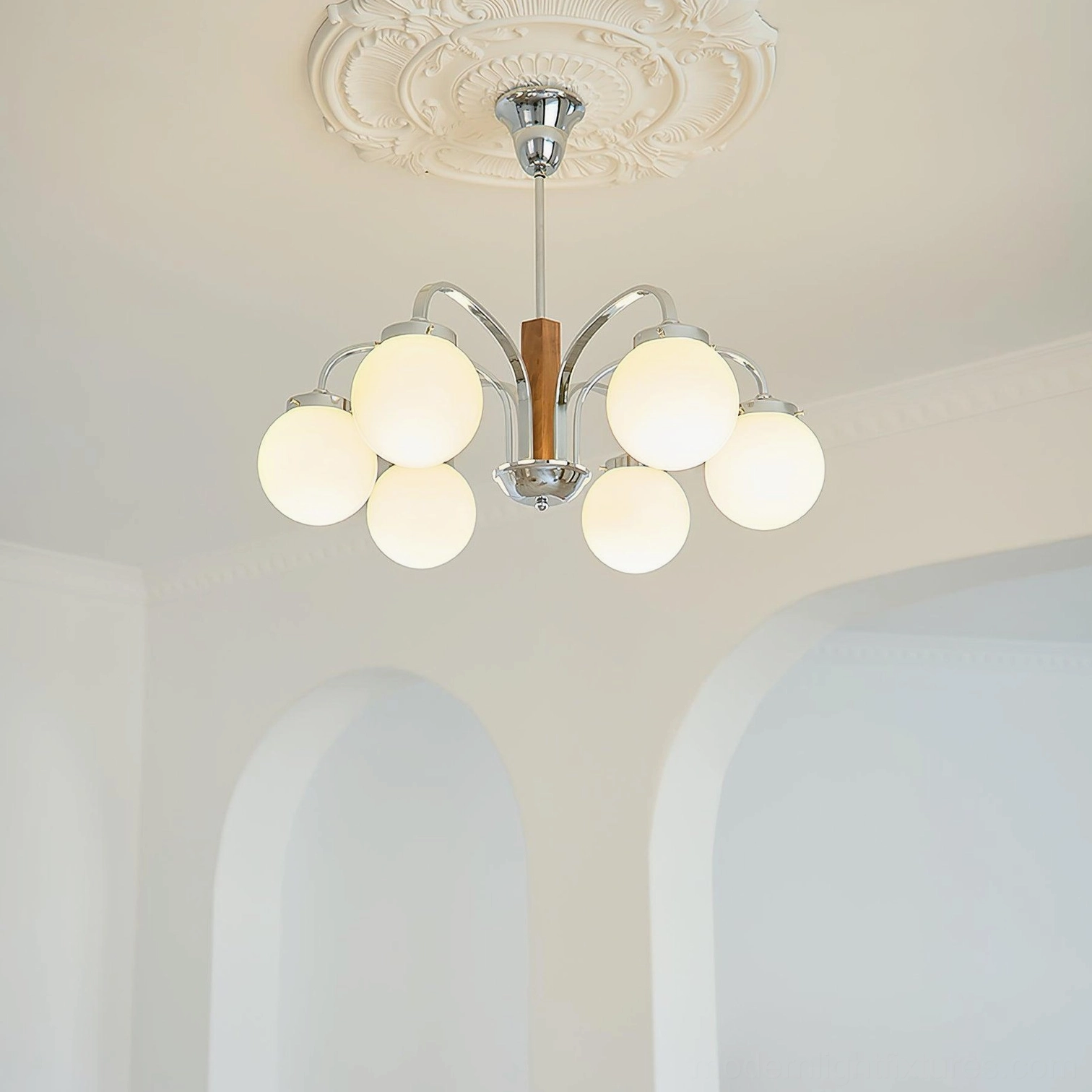 Multi-light Polaris modern hanging fixture overhead perspective minimalist interior arched doorway