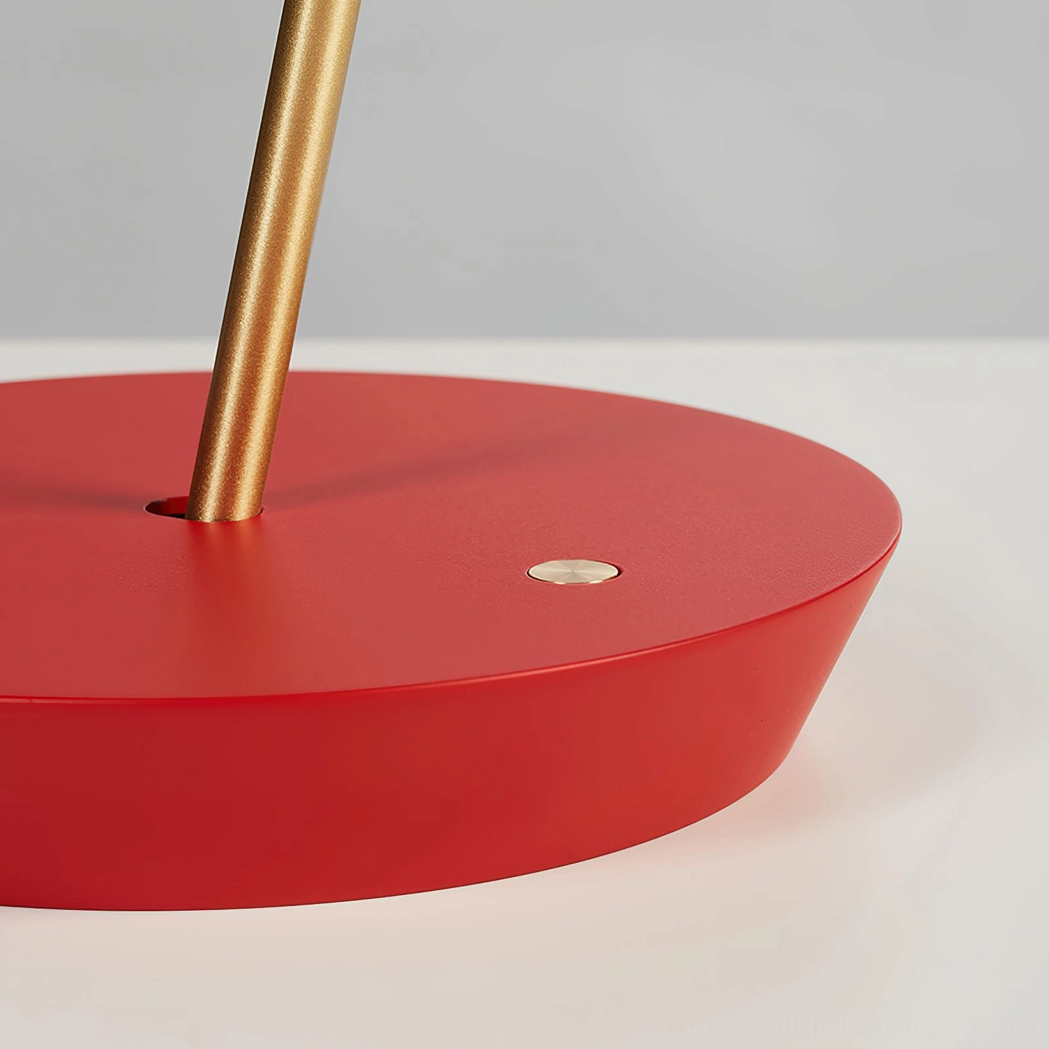 Black Poldina modern table lamp with integrated LED technology showcasing functional design excellence