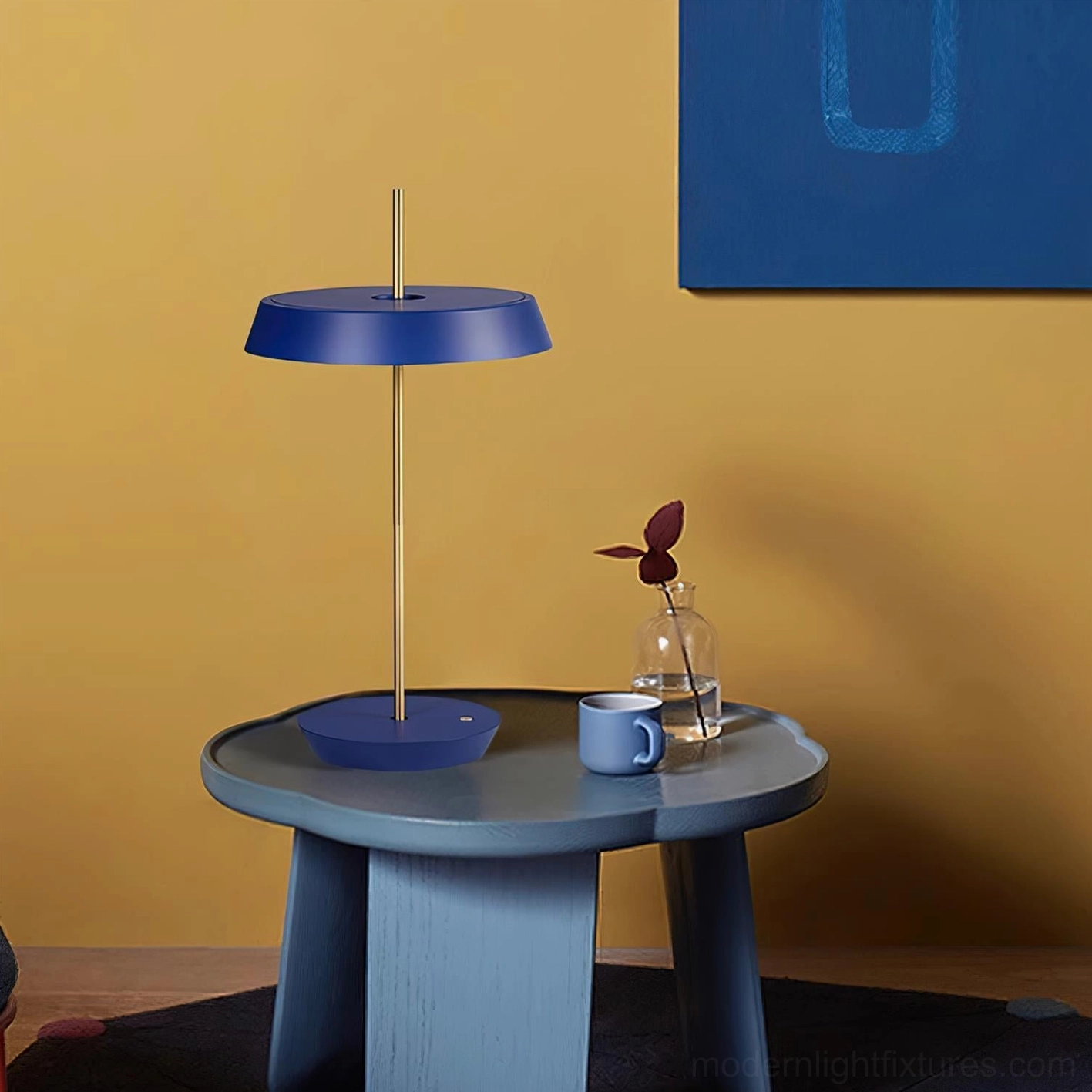 Blue Poldina disc table lamp artistic statement piece in contemporary home decor setup