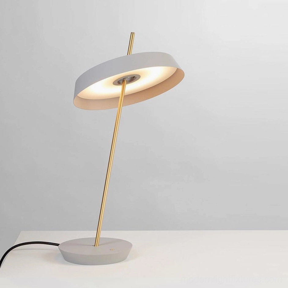 White Poldina contemporary disc table lamp with elegant proportions and geometric base design