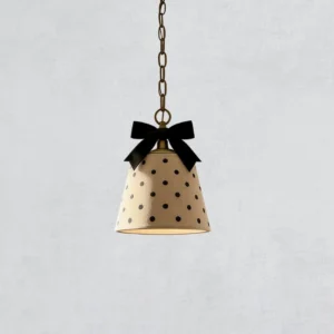 Black and beige polka dot pendant lamp with ribbon bow, top-down view showing shade design and metal chain attachment