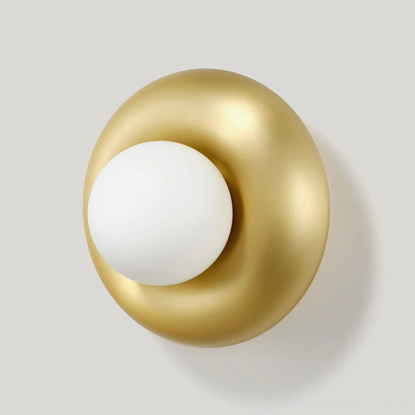 Gold brass-tone Pop wall sconce resin finish with opal glass globe, warm metallic accent lighting fixture