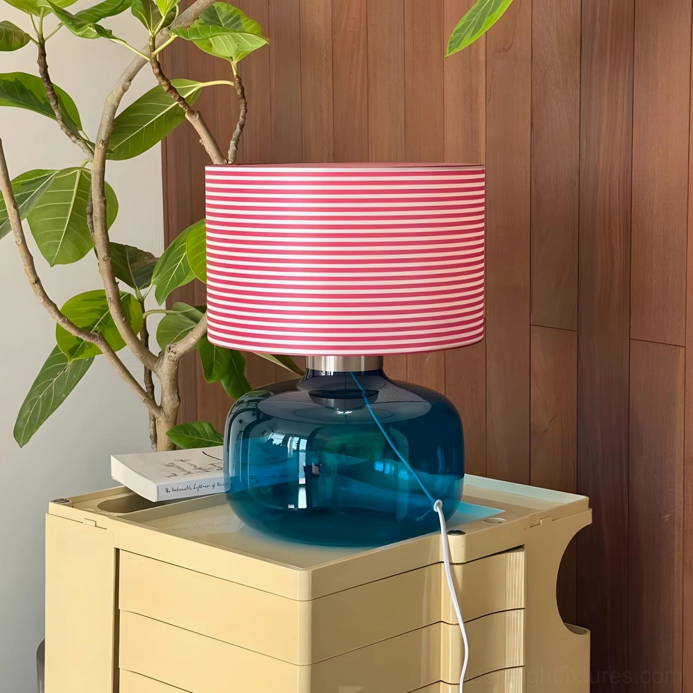 Popello blue glass table lamp corner setting wooden wall green plant indoor side table
