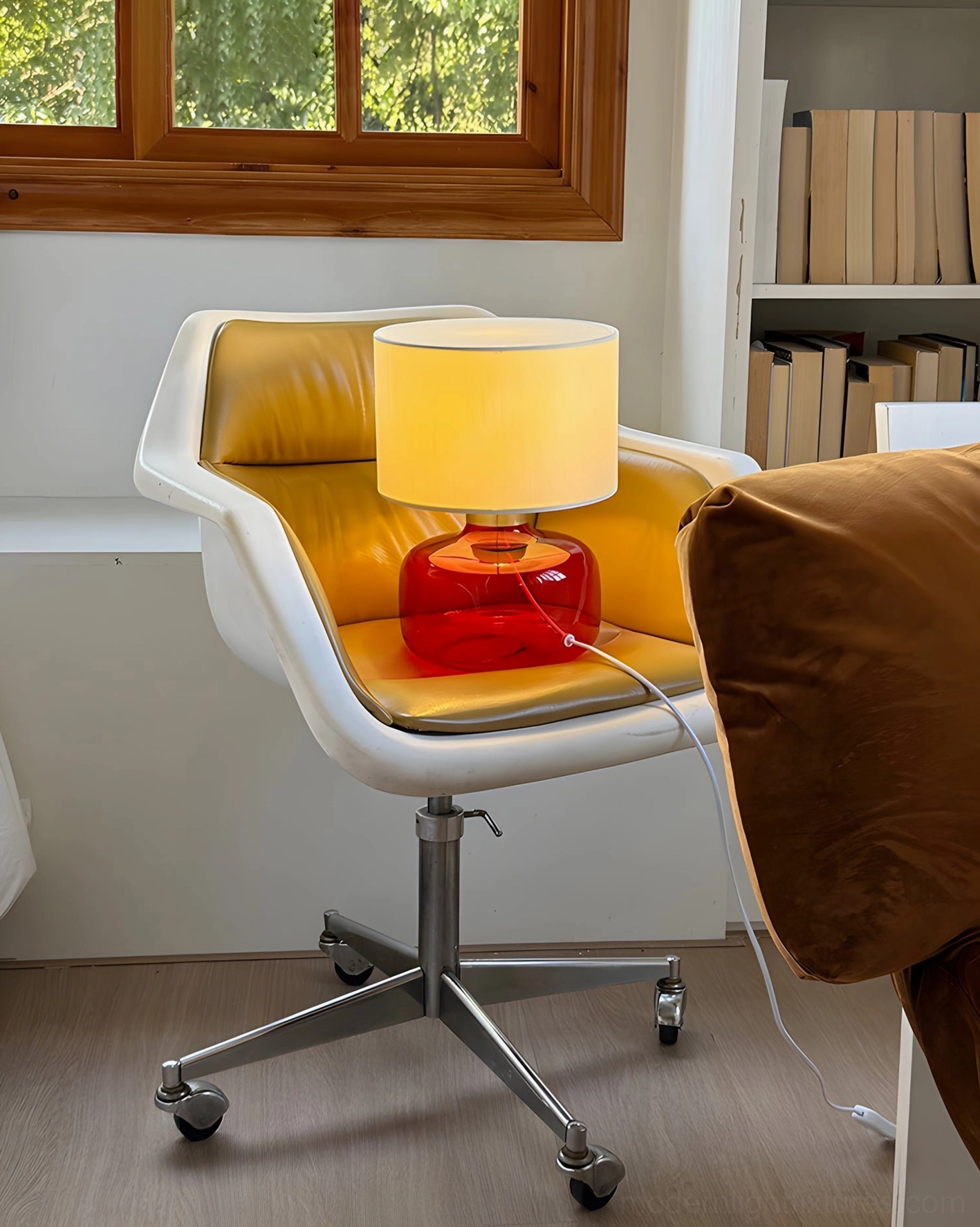 Popello red glass table lamp side view home office setting with white fabric shade and wooden floor