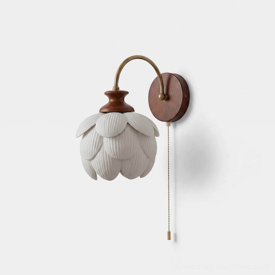 Camiora porcelain lotus wall sconce front view with hand-shaped ceramic petals and warm metal arm on white background