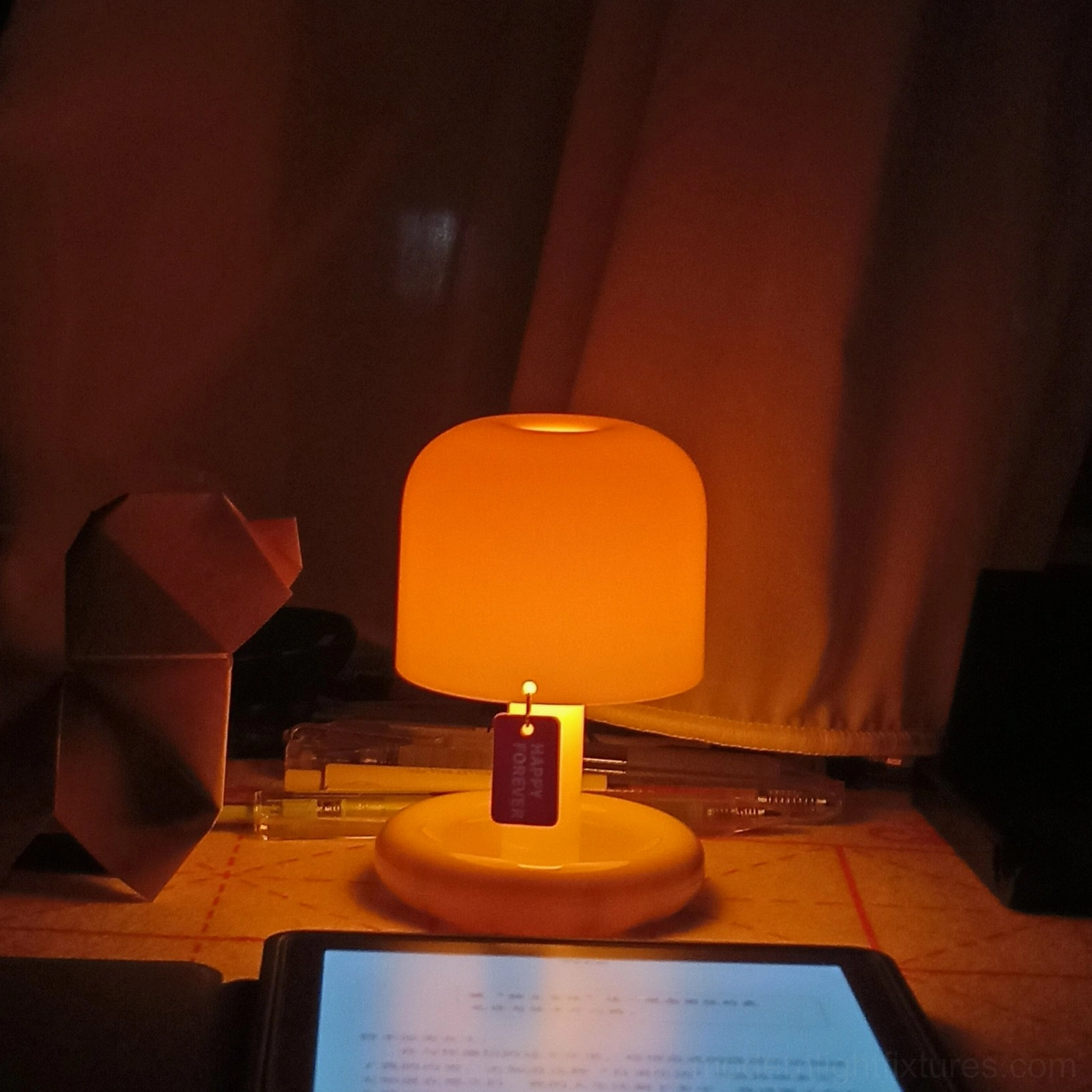 Portable Mini Mushroom Lamp on decorative surface - Lifestyle photography