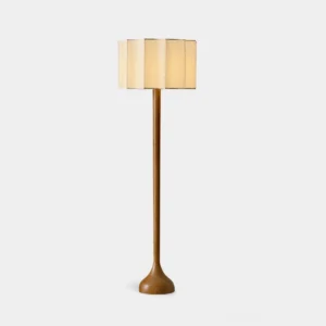 Portillo handwoven fabric floor lamp with segmented shade and warm walnut tapered pole base, front studio view