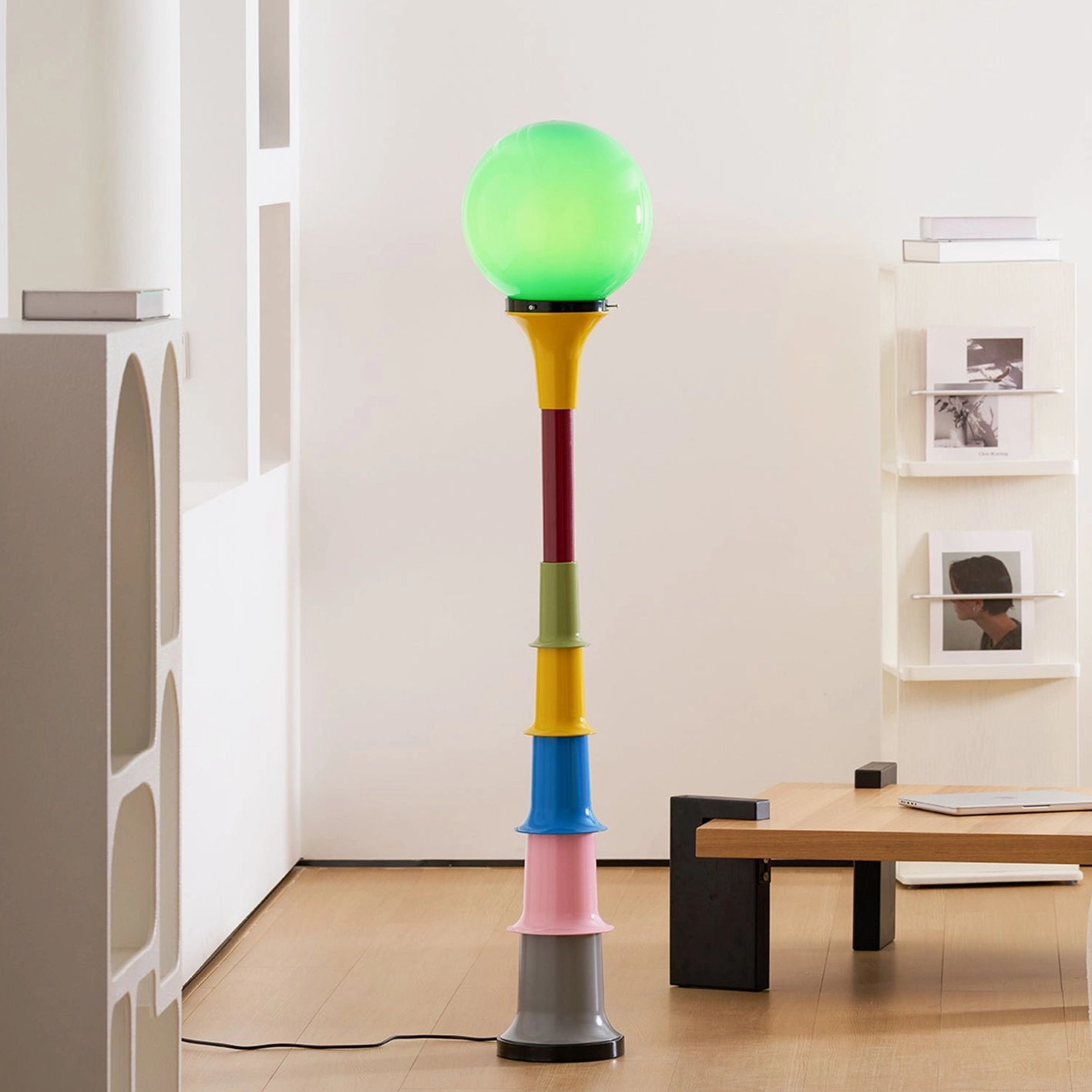 Colorful segmented floor lamp displaying artistic postmodern design aesthetic
