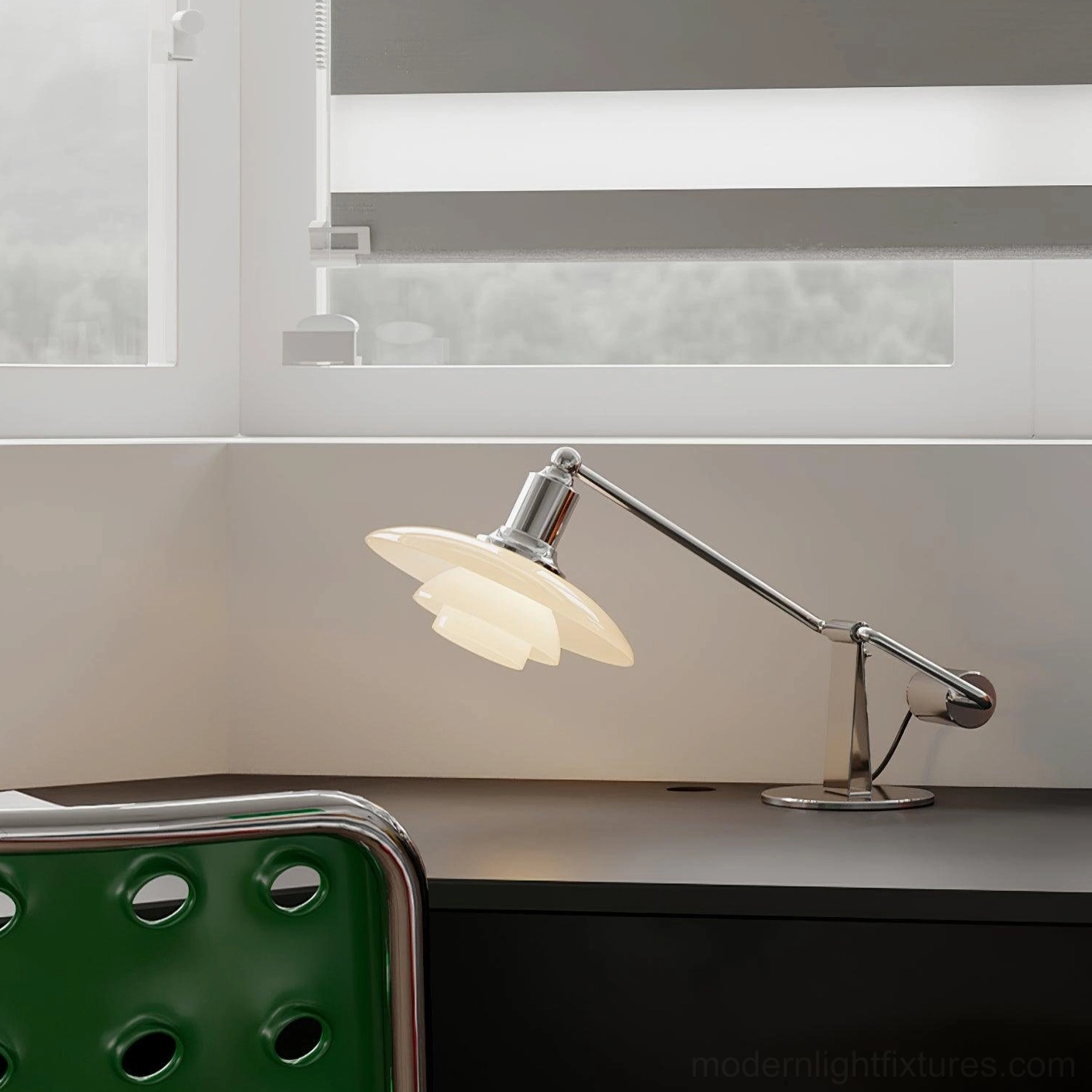 Poul contemporary table lamp with polished chrome finish and frosted glass shade in minimalist office