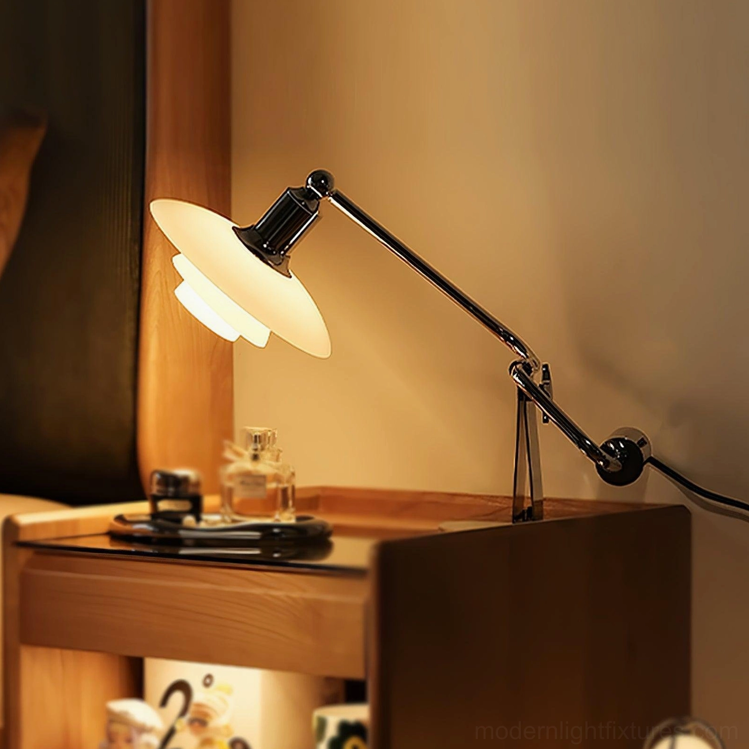 Vintage-inspired Poul table lamp with off-white glass shade on elegant wooden vanity desk