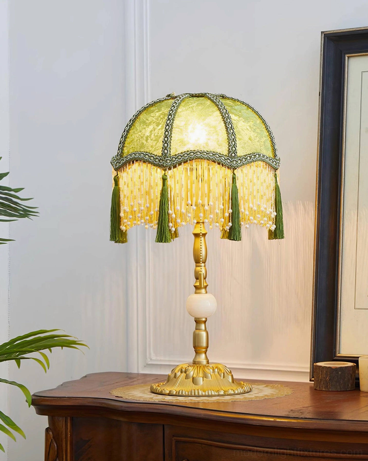 Premium emerald green velvet table lamp with beaded trim and gold metal base craft details