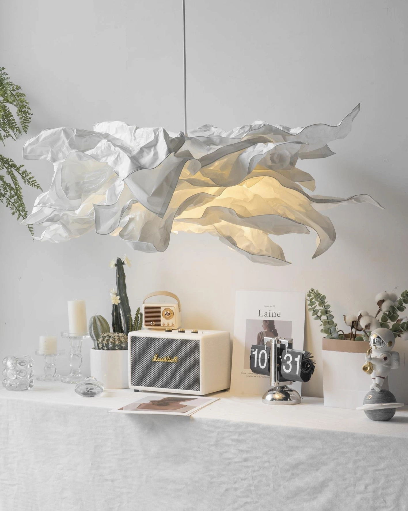 Handcrafted paper pendant ceiling fixture detail showing premium material quality and construction