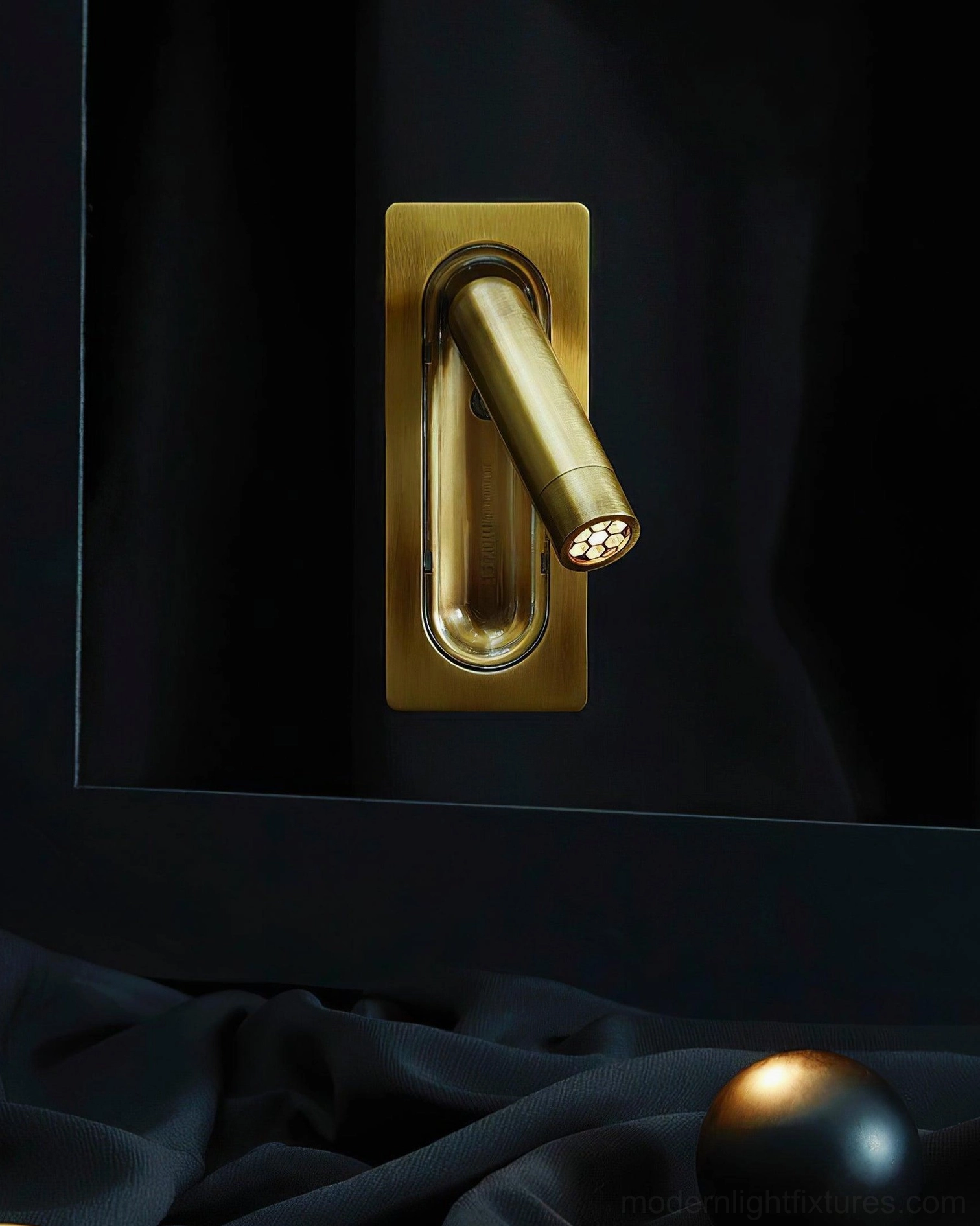 Recessed wall reading lamp detail view showing premium metal construction and refined aesthetic finish options