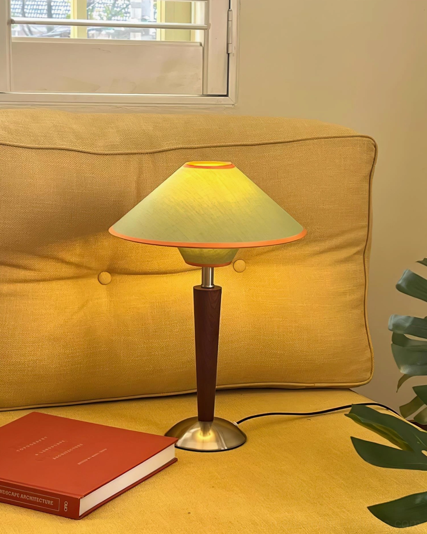 Premium fabric table lamp with solid wood pole and stainless steel base showing craftsmanship and material quality