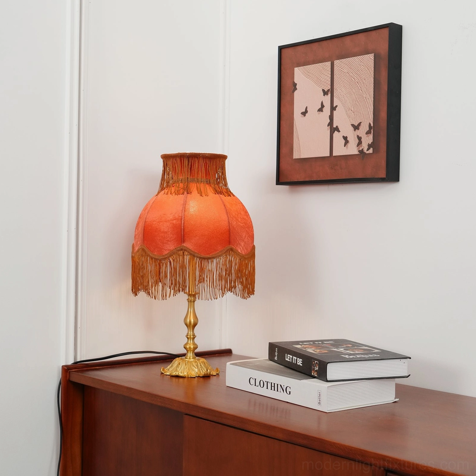 Premium tassel table lamp featuring handmade brass construction and luxurious velvet shade