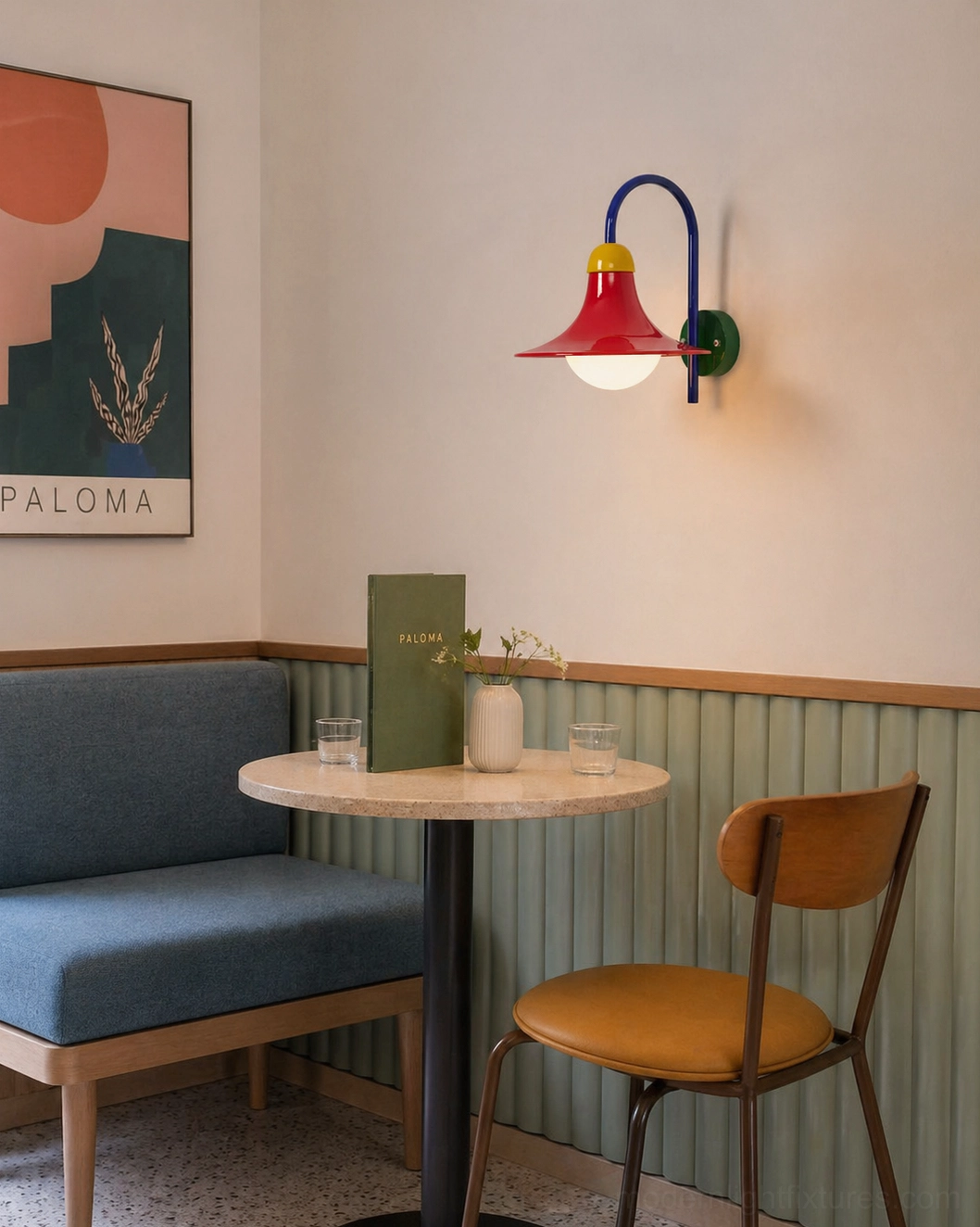 Retro modern wall sconce mounted on cafe wainscoting panel wall in dining booth setting for contemporary ambiance
