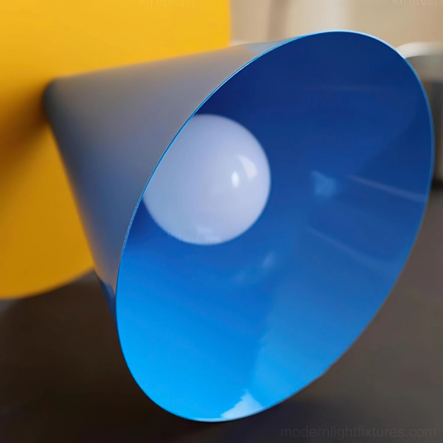 Close-up detail of Prisma Play pendant light glossy blue metal shade and bulb