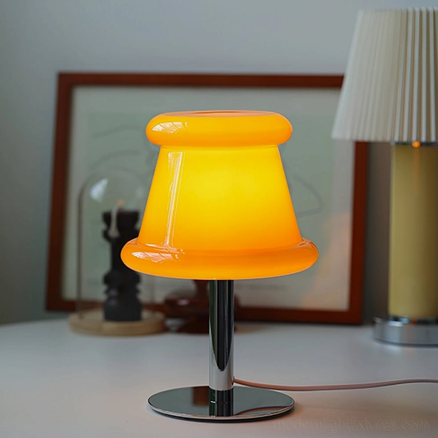 Pudding table lamp accent lighting on console table with interior decoration and home styling accessories arrangement