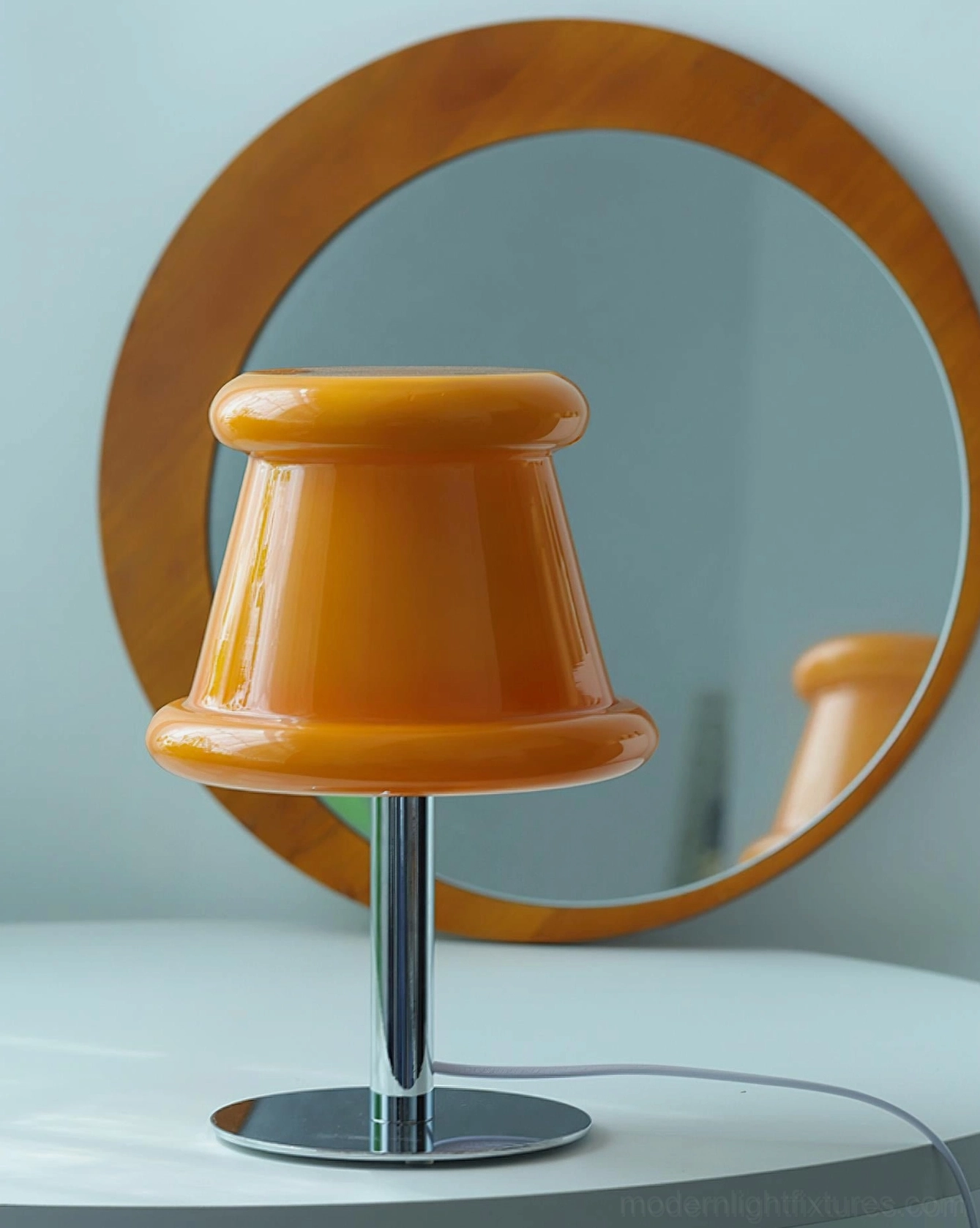 Pudding table lamp close-up detail of polished chrome stem and metal base construction quality and finish