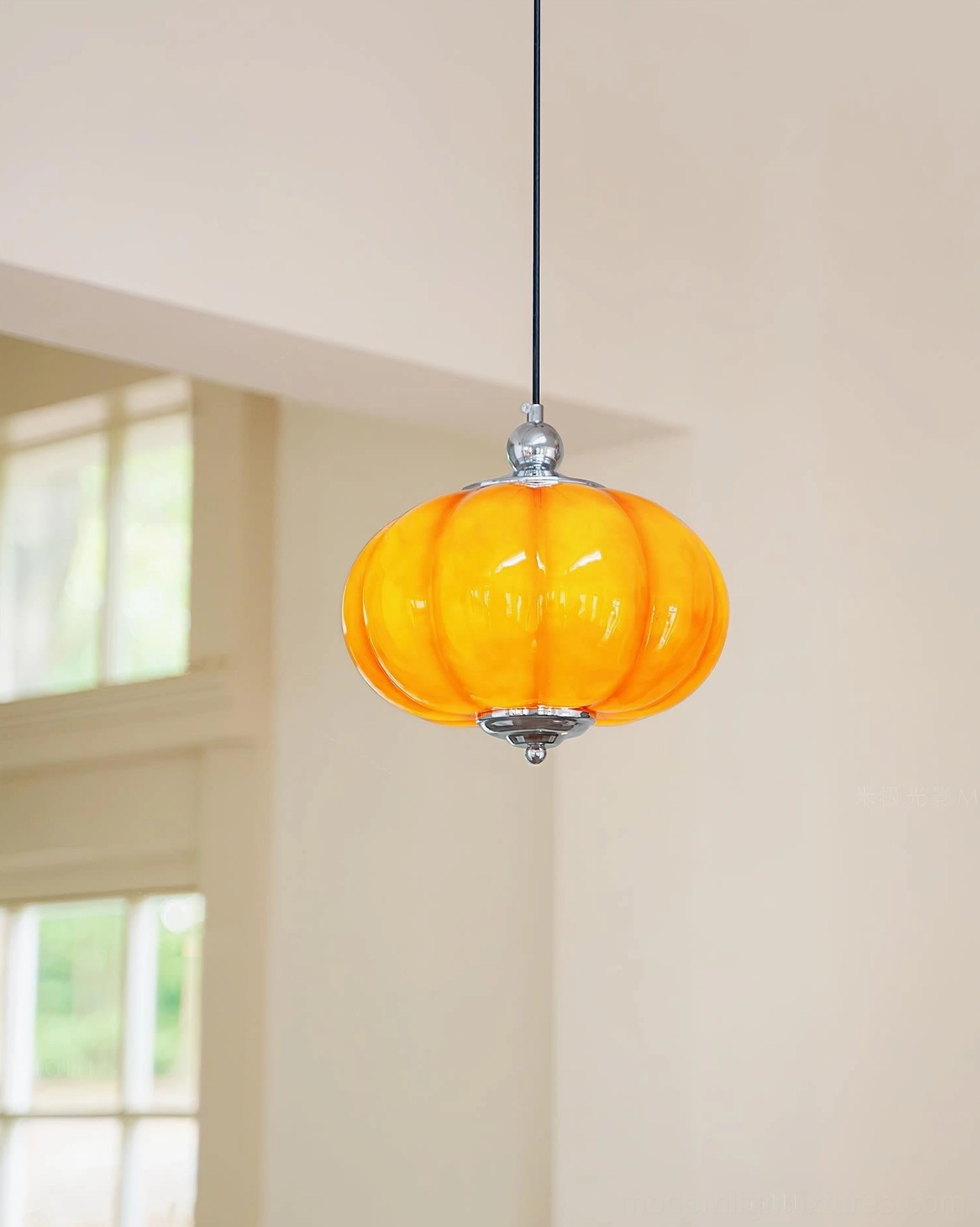 Amber orange handblown pumpkin glass pendant light with glossy ribbed glass texture