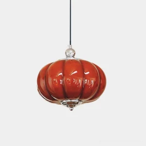 Pumpino handblown red glass pendant light with chrome hardware, front view