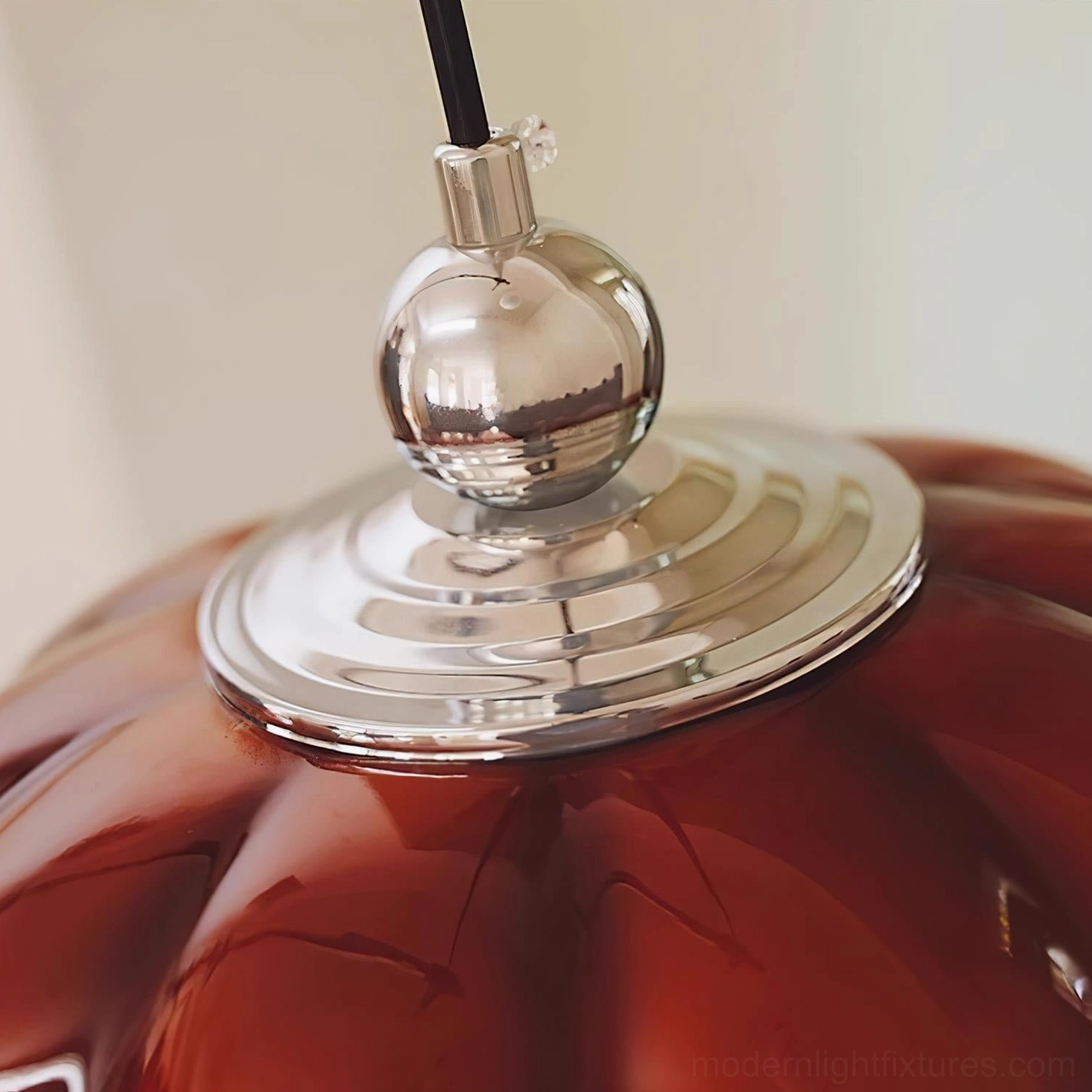 Vintage modern red glass pumpkin pendant lamp with polished chrome hardware showcase