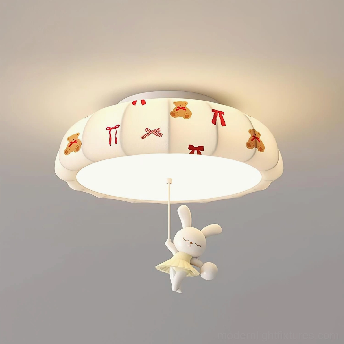 Blue-accented pumpkin ceiling lamp with extended drop height and hanging decorative character in nursery or kids' bedroom setting
