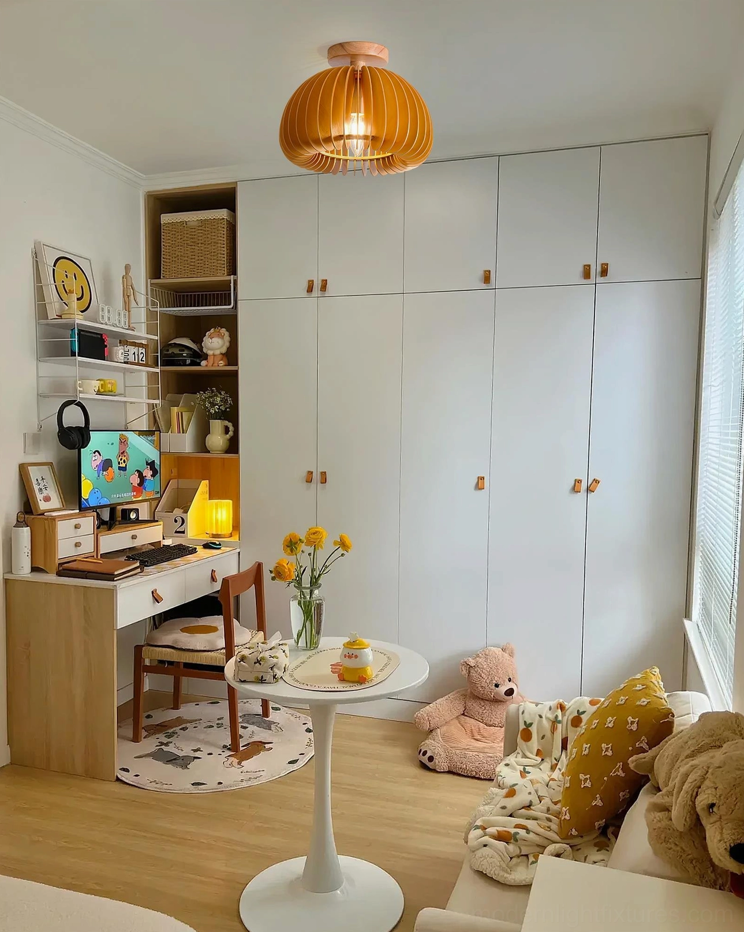 Home office space with pumpkin ceiling light fixture providing warm task illumination