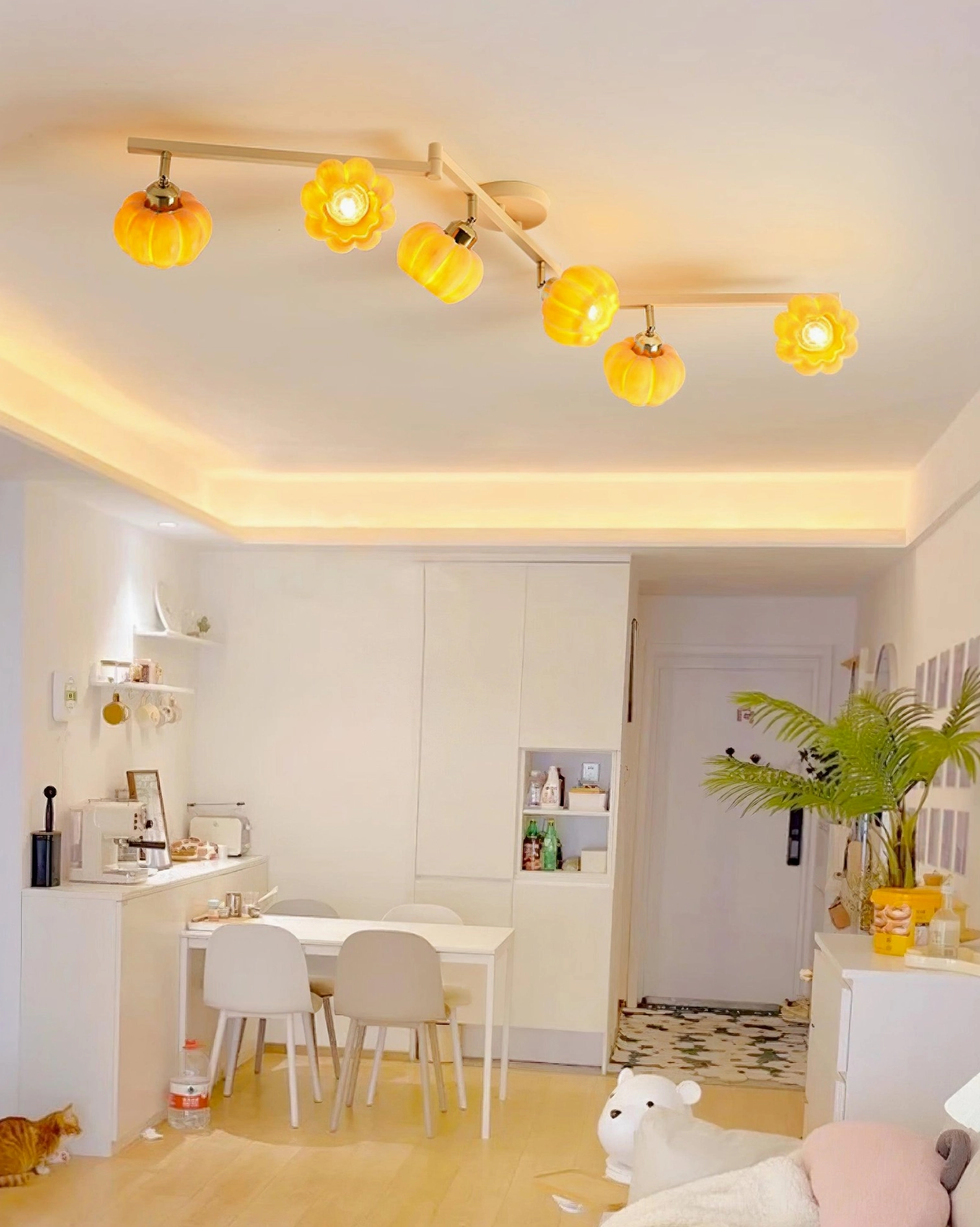 Multi-head pumpkin ceiling light with metal framework, resin canopy mount, professional installation view