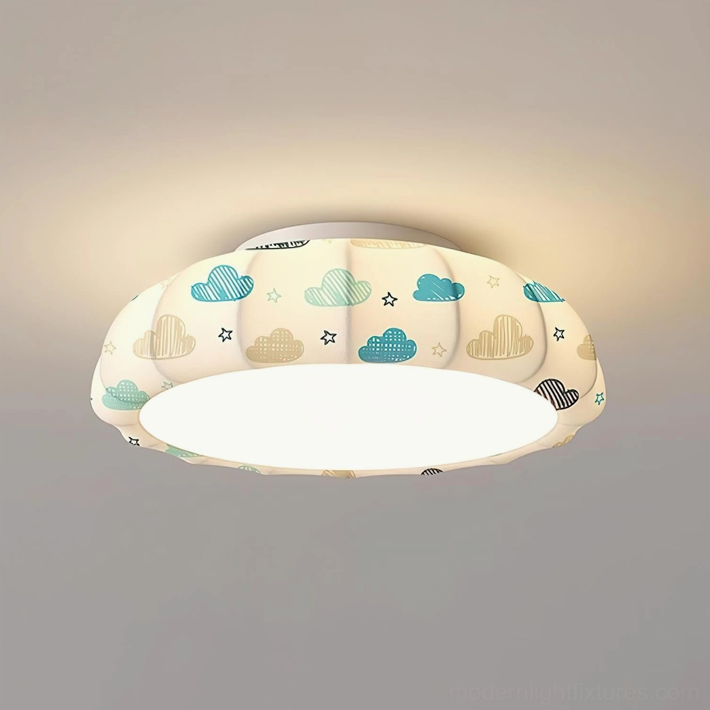 Overhead view of pumpkin ceiling light showing geometric shade shape, warm white integrated LED, and suspended ornament placement