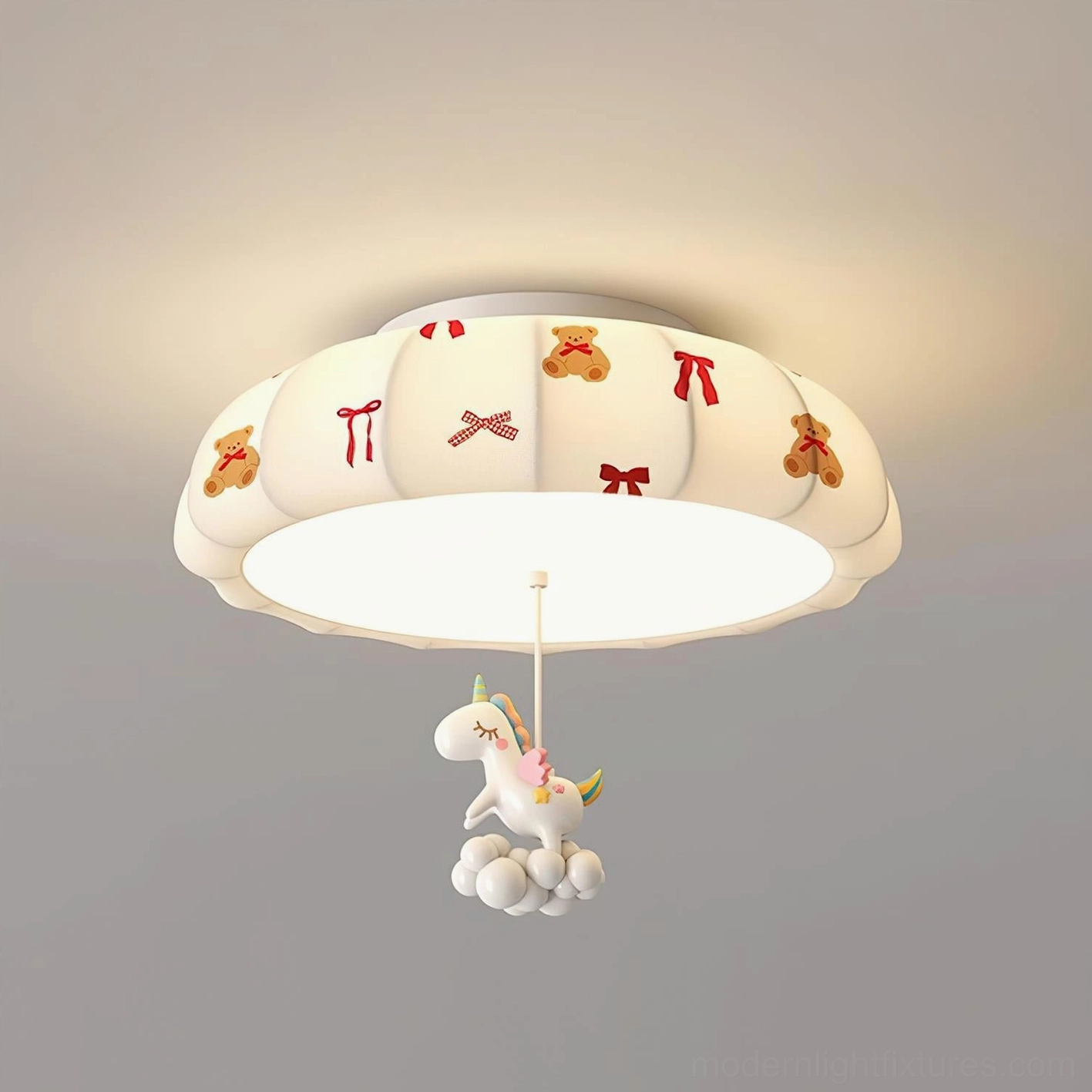 Red-accented pumpkin ceiling light with extended drop and suspended character ornament in modern children's bedroom interior