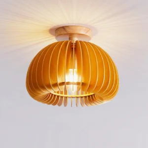 Top-down view of modern pumpkin ceiling light showing warm light diffusion through wooden layers