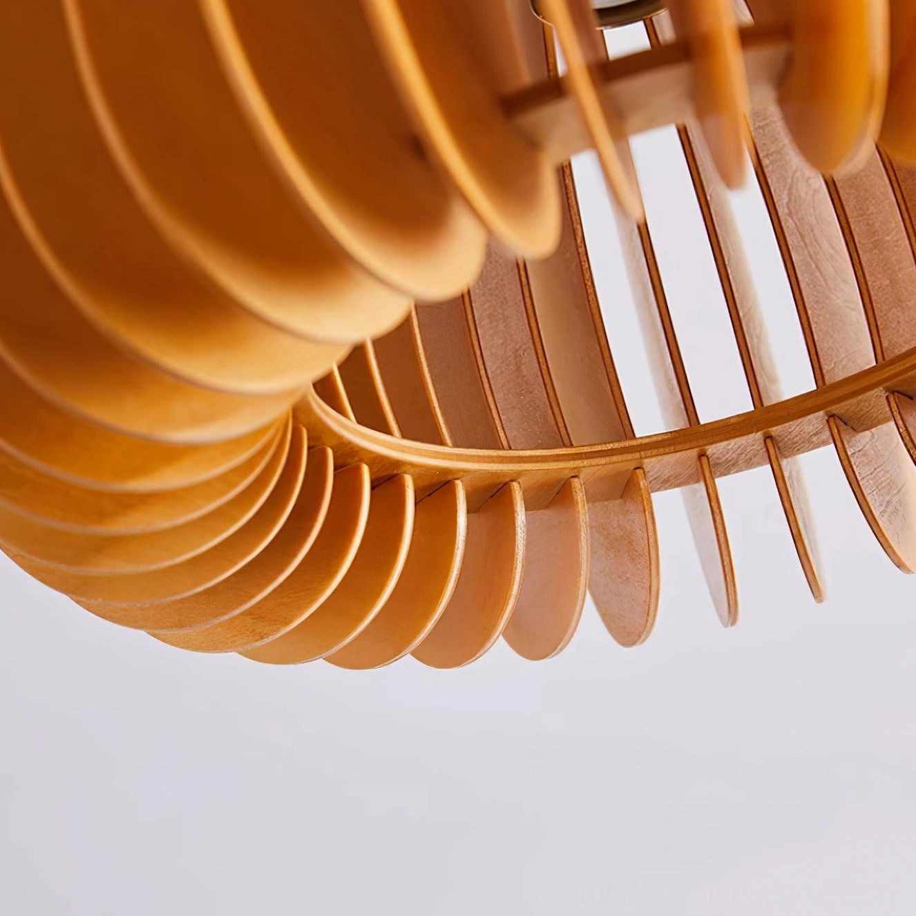 Close-up view of pumpkin ceiling light fixture showing natural basswood texture and craftsmanship