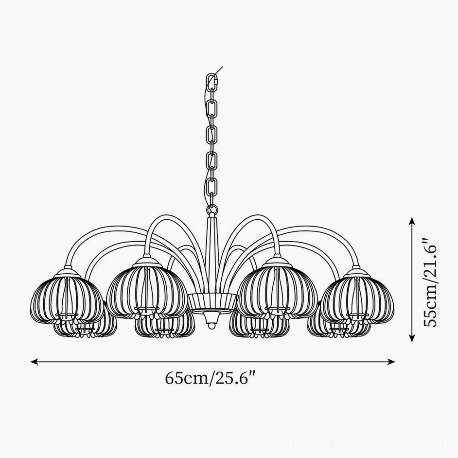 Lit pumpkin chandelier in boho retro family living room paired with green sofa and cozy decor