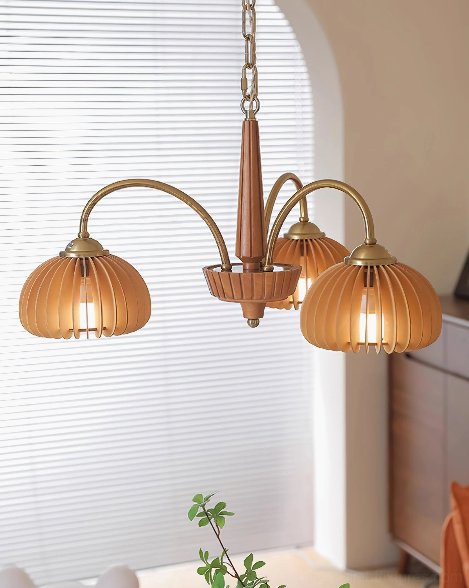 Full view of pumpkin ribbed glass chandelier showing all arm configuration and scale