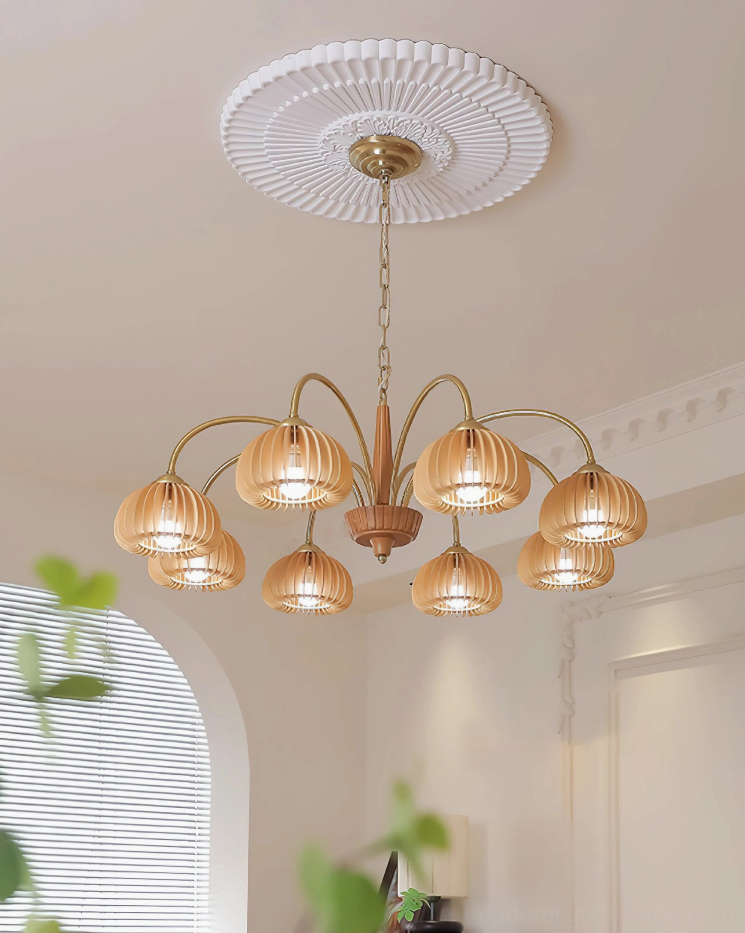 Multiple head pumpkin chandelier arrangement displaying vintage copper and wood finish